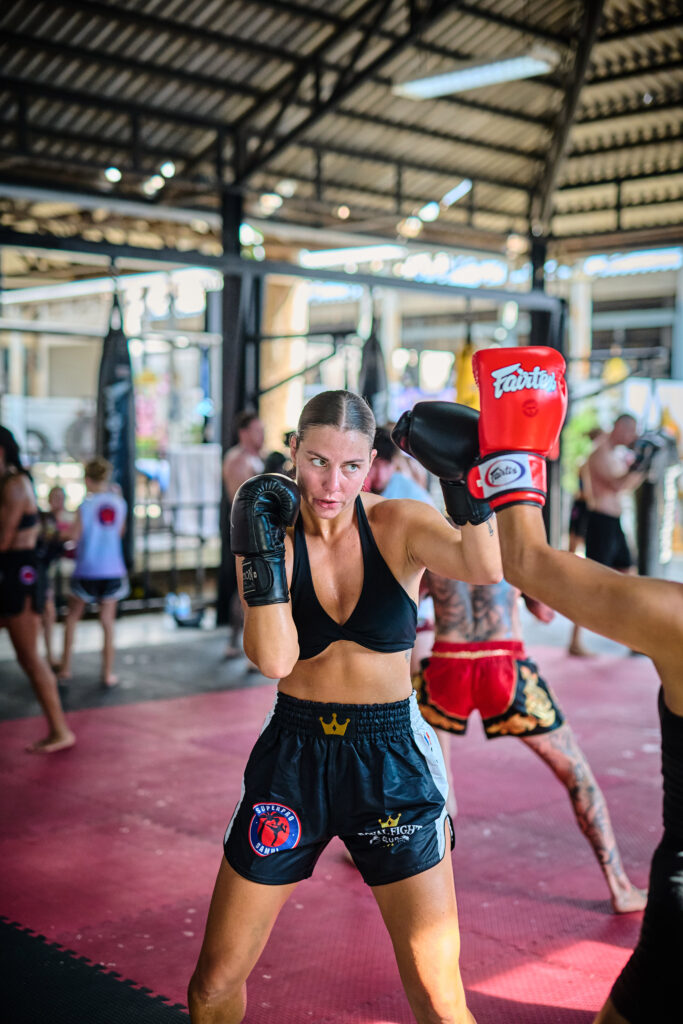 Muay Thai pad work with a Thai trainer at Superpro Samui