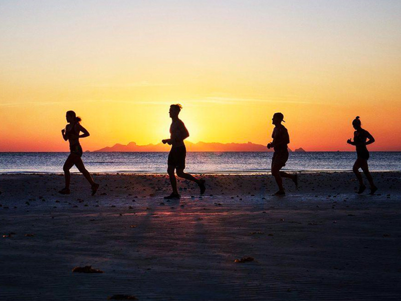 Sunrise beach running in Koh Samui